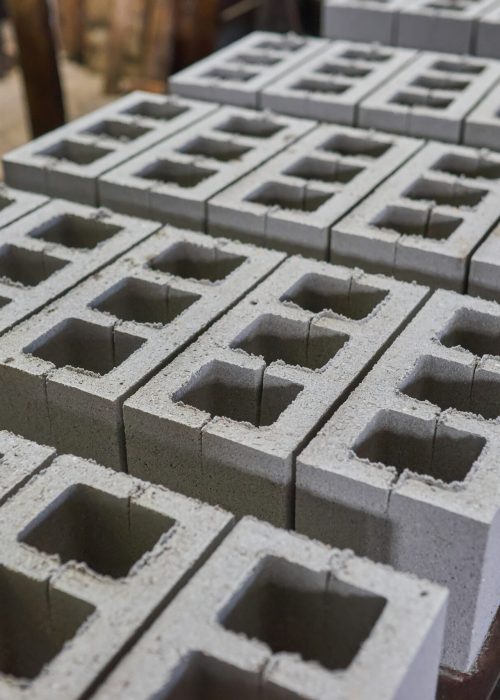 Cinder blocks lie on the ground and dried. on cinder block production plant